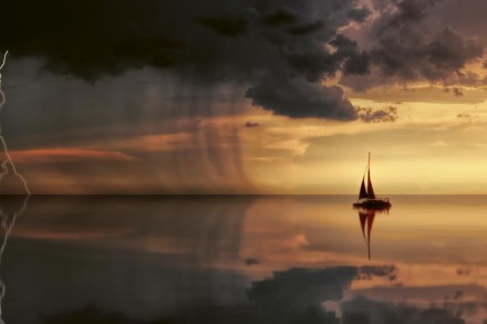 silhouette-photography-of-boat-on-water-during-sunset-1118874